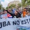Cubano encara manifestación a favor del régimen castrista en España