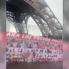 Cubanos alzan la voz en la Torre Eiffel para exigir libertad de presos políticos en la Isla (1)