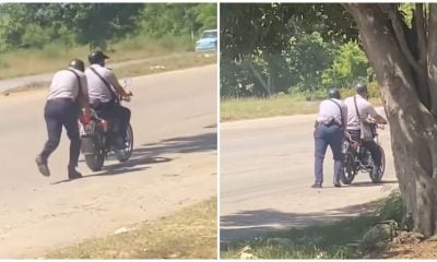 Policías empujando en Cuba