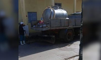 Recogen basura con camión que transporta leche para niños en Morón